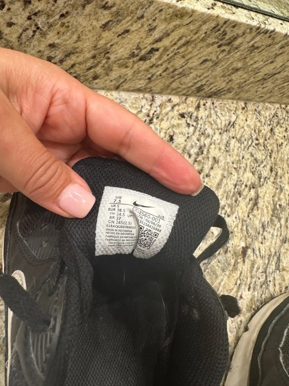 Women's Nike Black and White Low-Top Running Sneakers